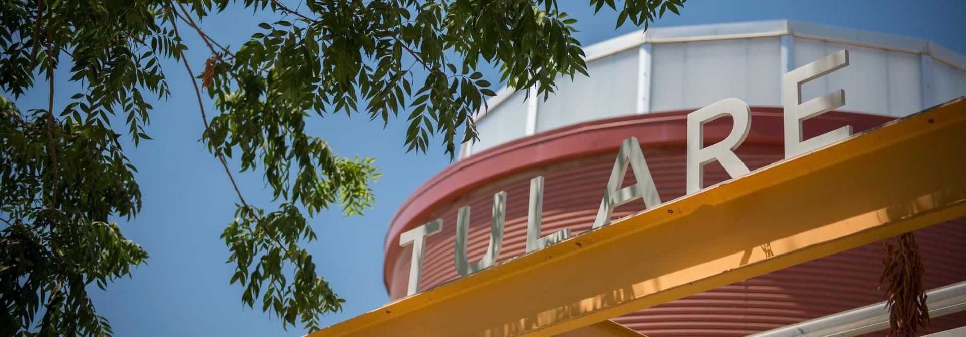Signage of the word "Tulare" on top of a building